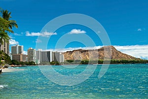 Waikiki beach with azure water in Hawaii with Diamond Head photo