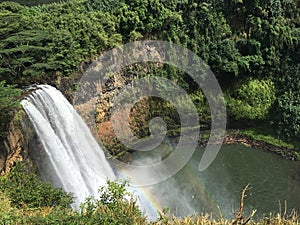 wailea water falls hawaii kauai green trees rainbow mist