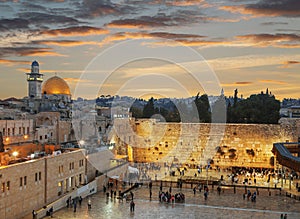 The wailing Wall and the Dome of the Rock in the Old city of Jerusalem at sunse