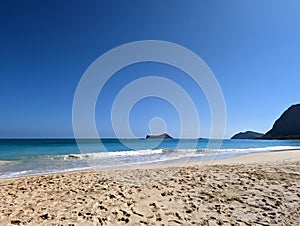 Waimanalo Beach View on a Sunny Day With Clear Blue Skies and Gentle Waves