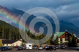 Waining rainbow over Mount Norquay lodge. Banff National Park Alberta Canada