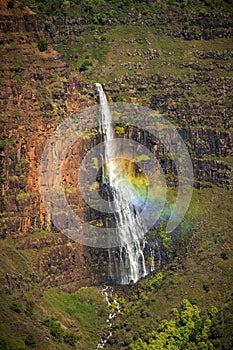 Waipo’o Falls Flashing a Beautiful Rainbowin Waimea Canyon, Kauai, Hawaii