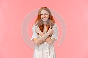 Waist-up portrait lovely feminine, sensual redhead woman in white dress, asking your opinion, showing two variants