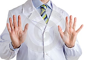 Wait and listen gesture by man in medical coat