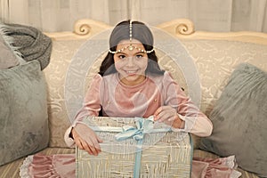 Wait for santa claus. Christmas time. Happy child with present box. Happy new year. Celebrate. Tenderness concept. Happy