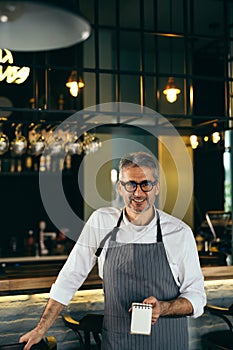 Waiter in cafe bar