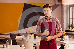 Waiter in eatery