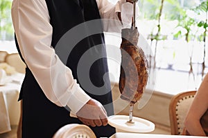 Waiter, fine dining and meat with service, skewer and restaurant for dinner or lunch. Person, food and luxury with