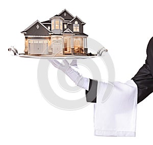 Waiter with gloves hand serve a building real estate photo