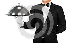 Waiter holding empty silver tray
