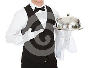 Waiter Holding Empty Silver Tray