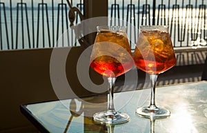 Waiter prepared the Aperol Sprits summer cocktail with Aperol, p