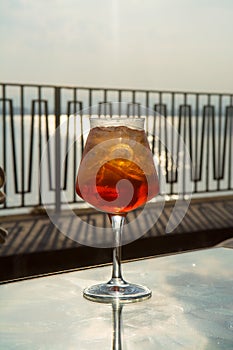 Waiter prepared the Aperol Sprits summer cocktail with Aperol, p