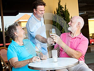 Waiter Serves the Wine