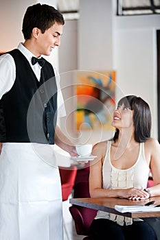 Waiter Serving Coffee photo