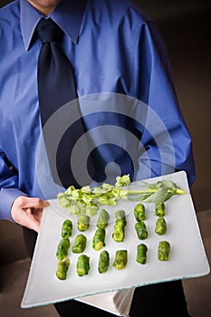 Waiter serving food