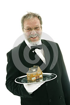 Waiter serving a house