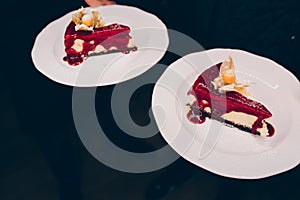 Waiter serving tray with delicious  tasty  Coffee expresso , close up view. dessert cuisine tart holding Pancake in cafe menu.Past