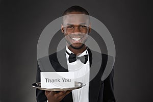 Waiter Showing Thank You Card