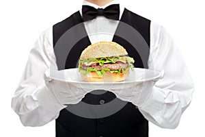 Waiter torso with hamburger on plate