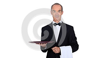 Waiter in tuxedo photo