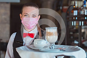 the waiter works in a restaurant. photo