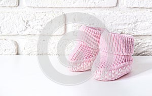 Waiting baby, baby shower. Pink girl newborn shoes