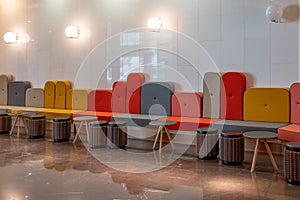 Waiting hall with colorful seats and chairs