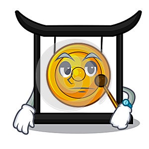 Waiting minuatur golden gong in cartoon shape photo