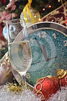 Waiting new year with a glass champagne party in december