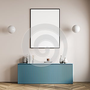 Waiting room interior with poster, blue sideboard