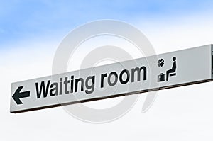 Waiting Room Sign Isolated against Sky Background