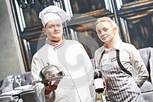 Waitres and chef in restaurant