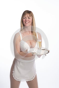 Waitress in apron with glass of wine