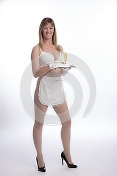 Waitress in apron with glass of wine