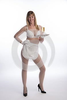 Waitress in apron with glass of wine