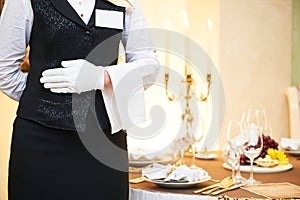 Waitress at catering service in restaurant