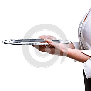 Waitress holding a silver tray isolated on white.
