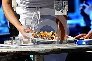 Waitress serving food