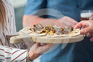 A waitress serving food on a plate