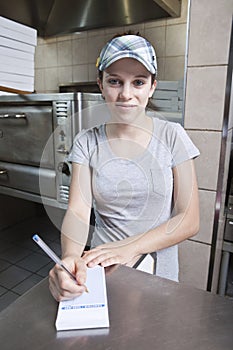 Waitress taking order in a fast food restaurant