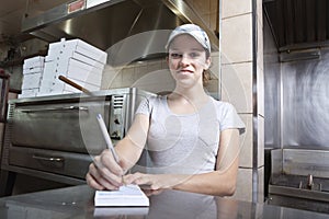 Waitress taking order in a fast food restaurant
