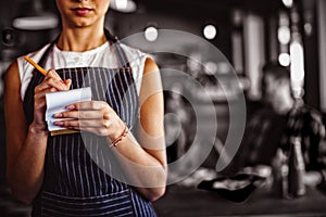 Waitress taking order at restaurant