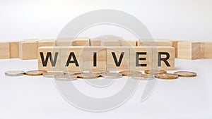 waiver concept, wooden word block on grey background
