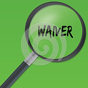 WAIVER text under a magnifying glass on green background. photo