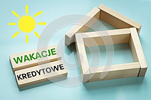 Wakacje Kredytowe text in Polish denoting credit holidays, State program to help borrowers in Poland repay loans during the crisis photo
