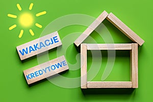 Wakacje Kredytowe text in Polish denoting credit holidays, State program to help borrowers in Poland repay loans during the crisis photo