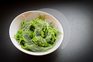 Wakame salad or seaweed salad.