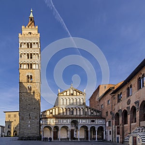 The wake of an airplane above the Duomo of Pistoia, Tuscany, Italy