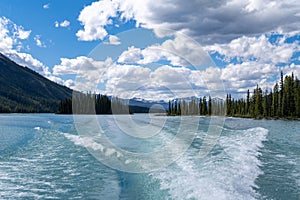 Wake of a boat leaving Spirit Island on Maligne Lake in Jasper National Park Alberta Canada